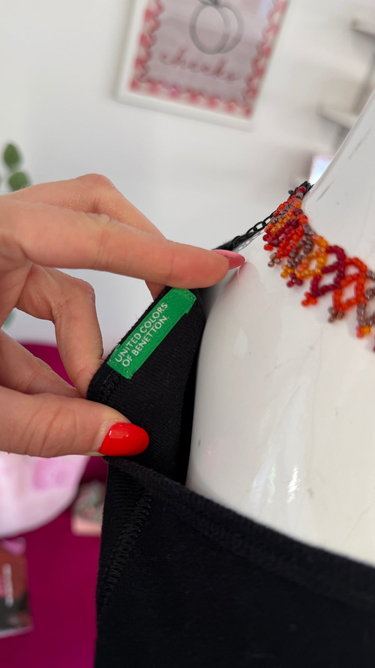 375 Benetton slogan top