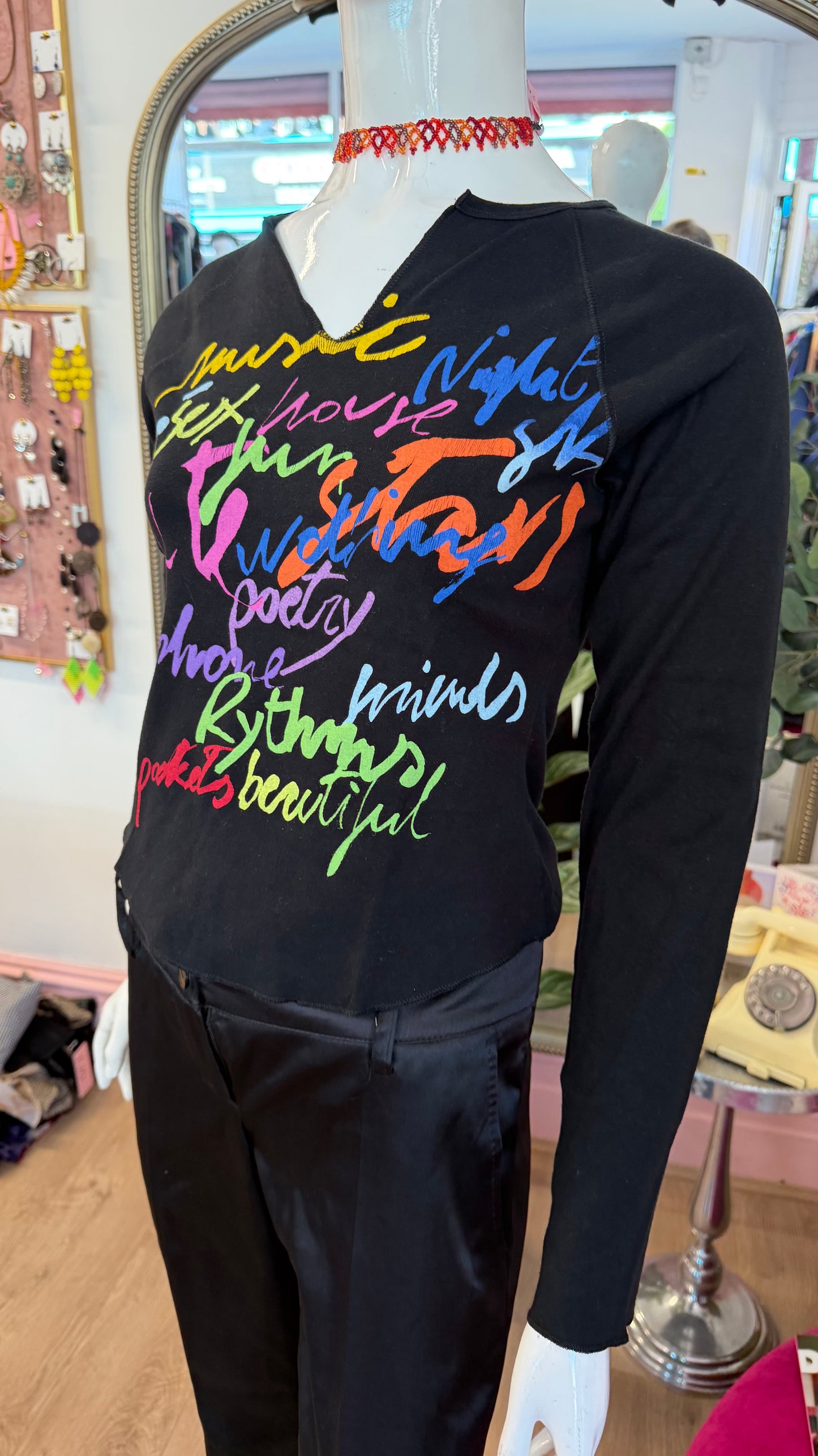 375 Benetton slogan top