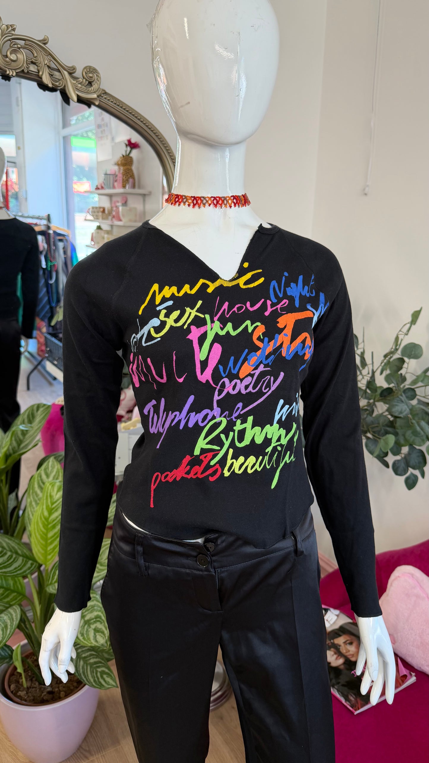 375 Benetton slogan top