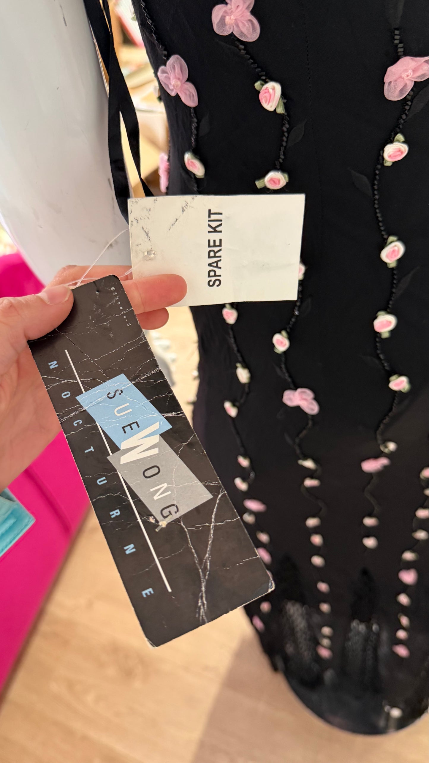 219 Black maxi dress with rose detailing