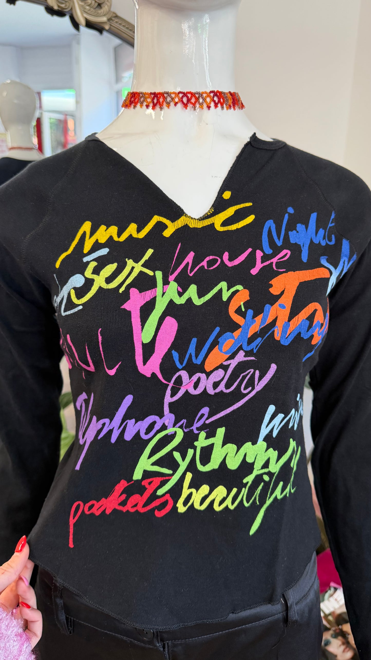 375 Benetton slogan top