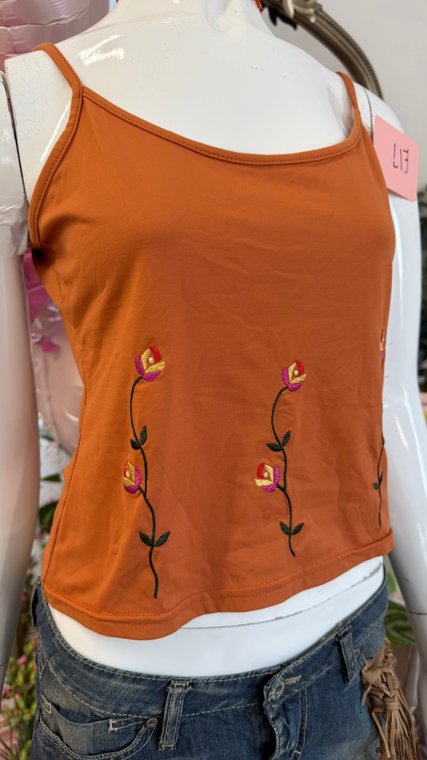322 Orange cami top with floral embellishment